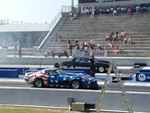 Mark lines up against a Corvette